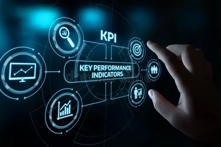 Image of the word KPI on a screen and a person clicking it. Taken from Dreamstime