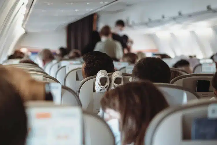 People sitting on a aircraft